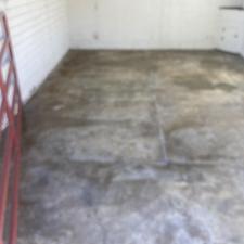 Pressure-washing-horse-stalls-using-hot-water-and-high-pressure-removing-rubber-mats-from-concrete-horse-pens 7